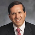 Dr. Roger P. Levin.