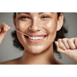 Flossing Woman
