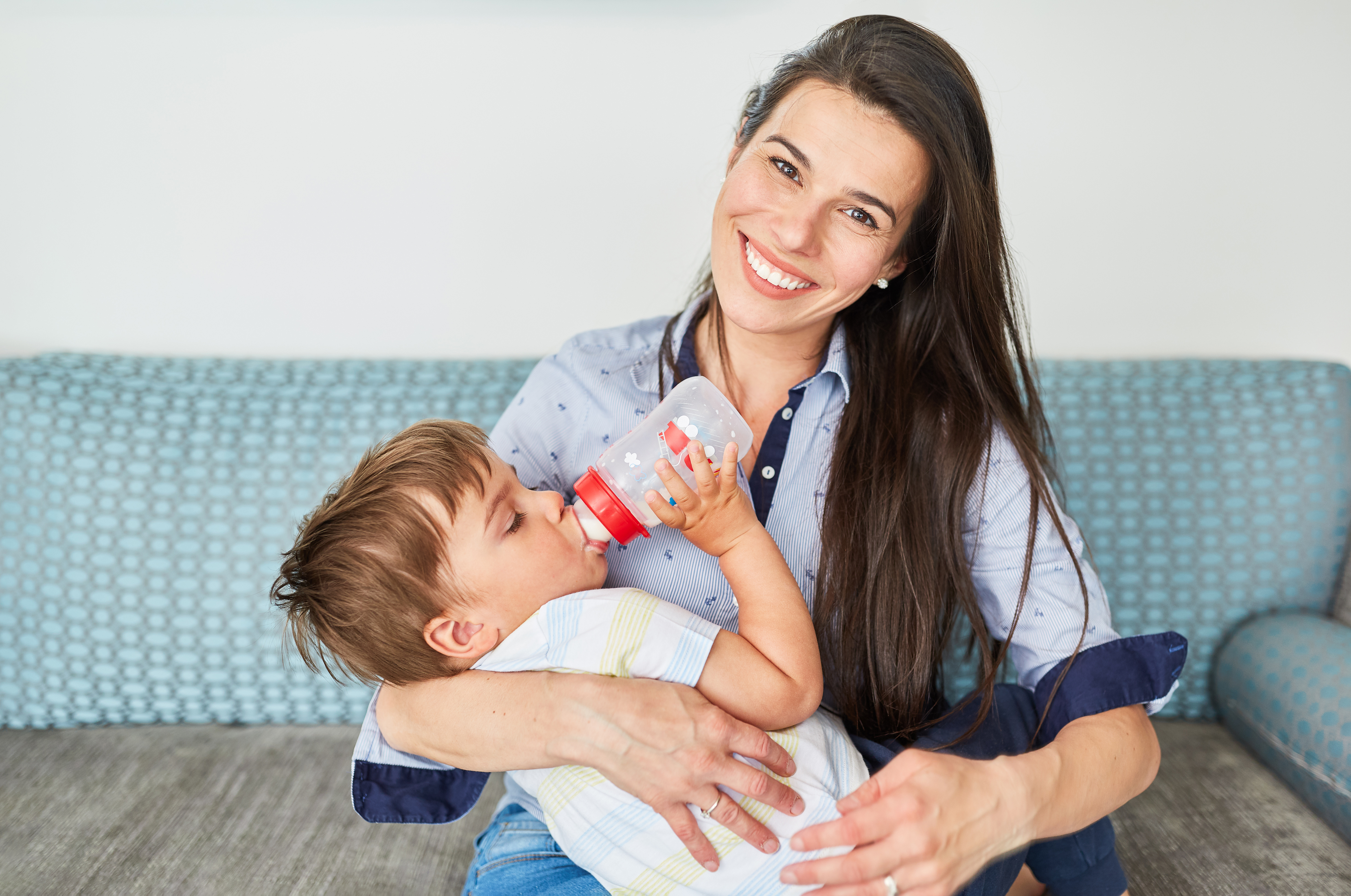 Bottle Feed Toddler Robert Kneschke