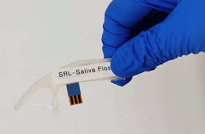 This dental floss pick has a sensor that can assess your stress level. Image courtesy of Atul Sharma and Nafize Ishtiaque Hossain.