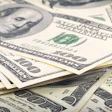 Stacked U.S. $100 bills.