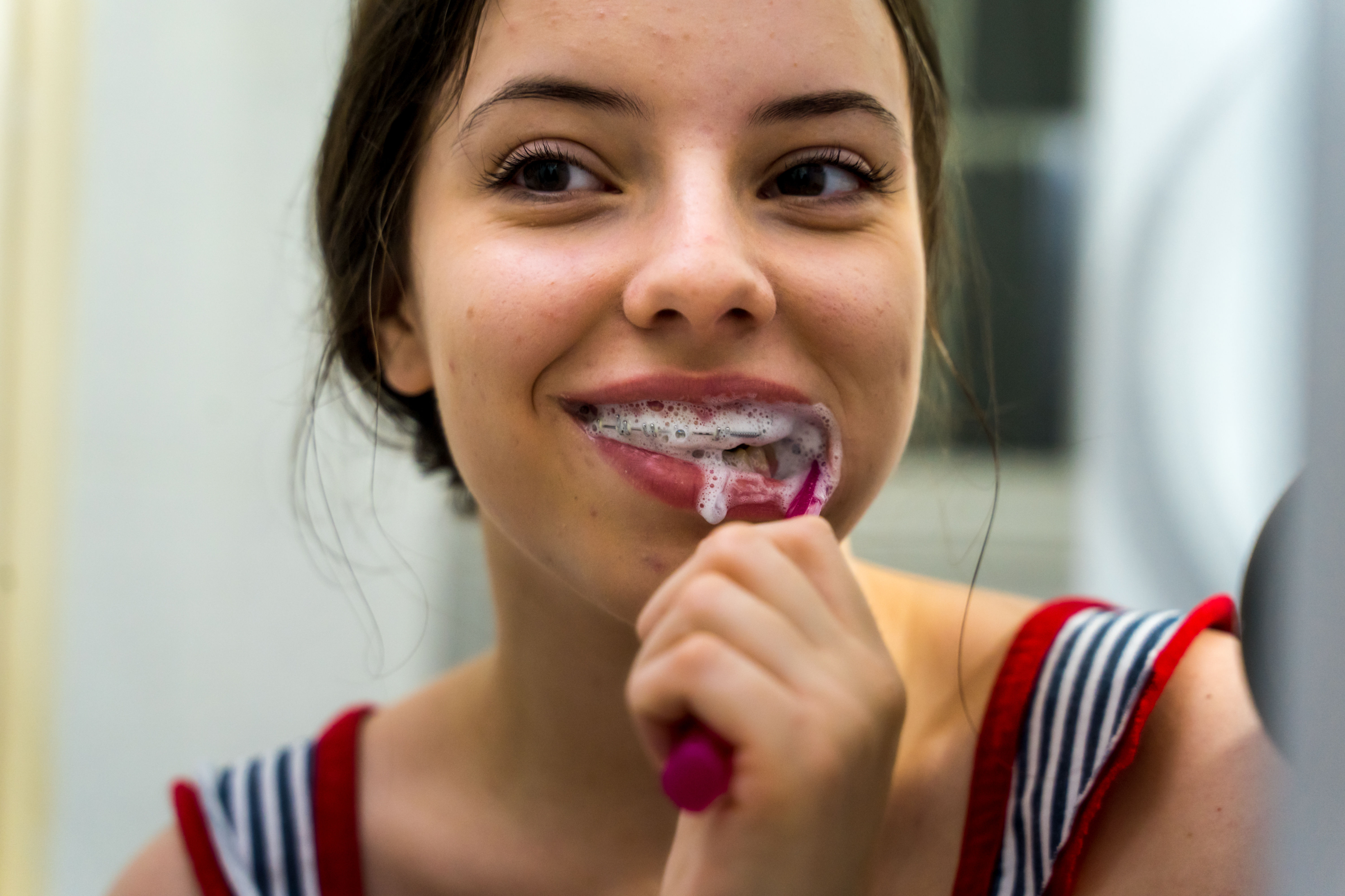 Teen Girl Brushing Dusan