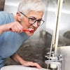 Woman Brushing Teeth