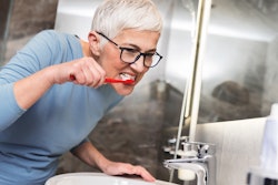 Woman Brushing Teeth