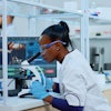 Woman Lab Microscope
