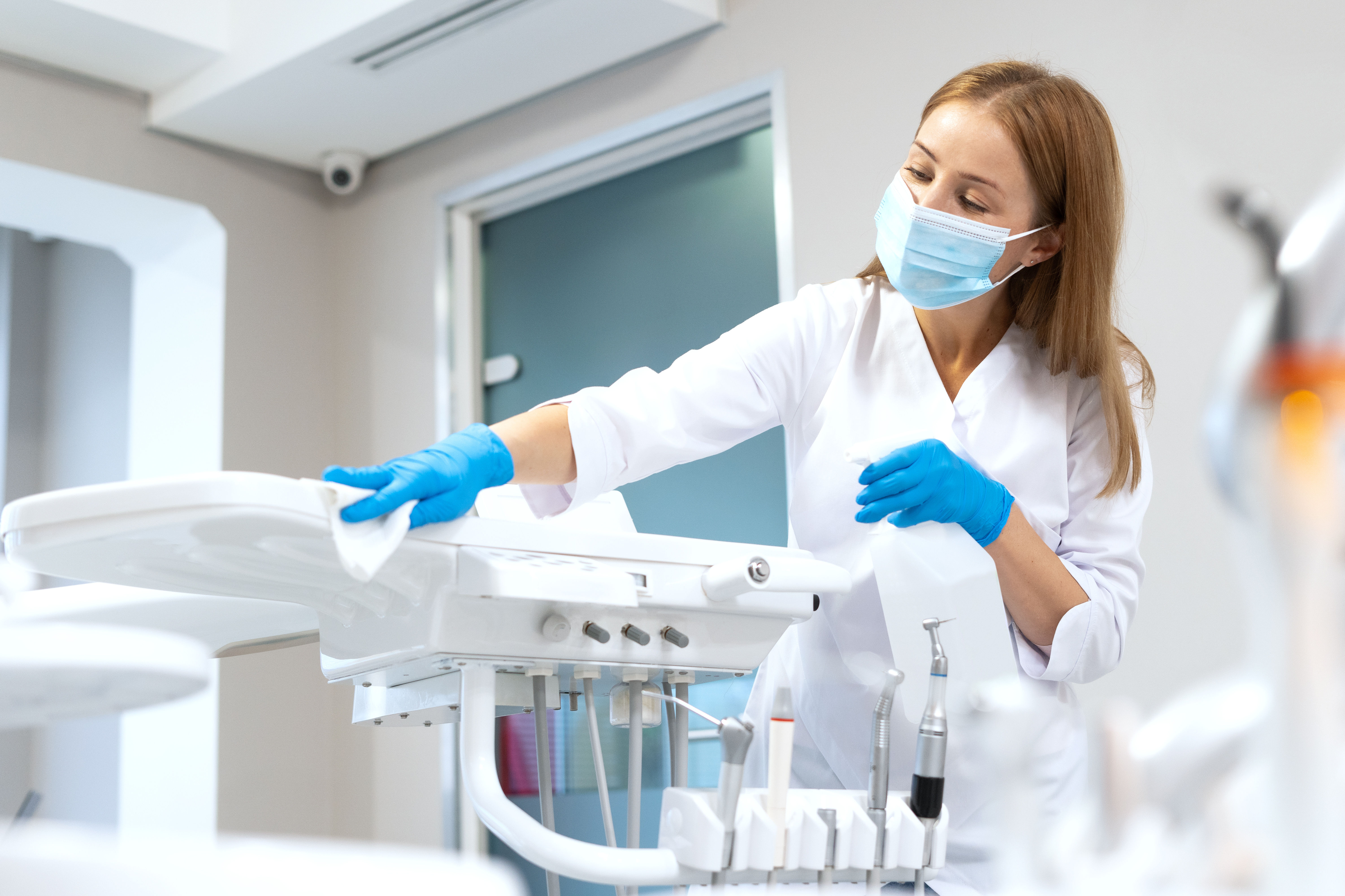 Dental Assistant Disinfecting