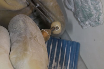 Figure 8b: Sandblasting intaglio of the implant crown.