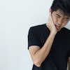 Young Man Holding Jaw