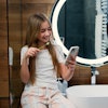 Girl Toothbrushing Smartphone Serg