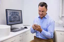 Dentist Calling Phone Wavebreakmedia Micro