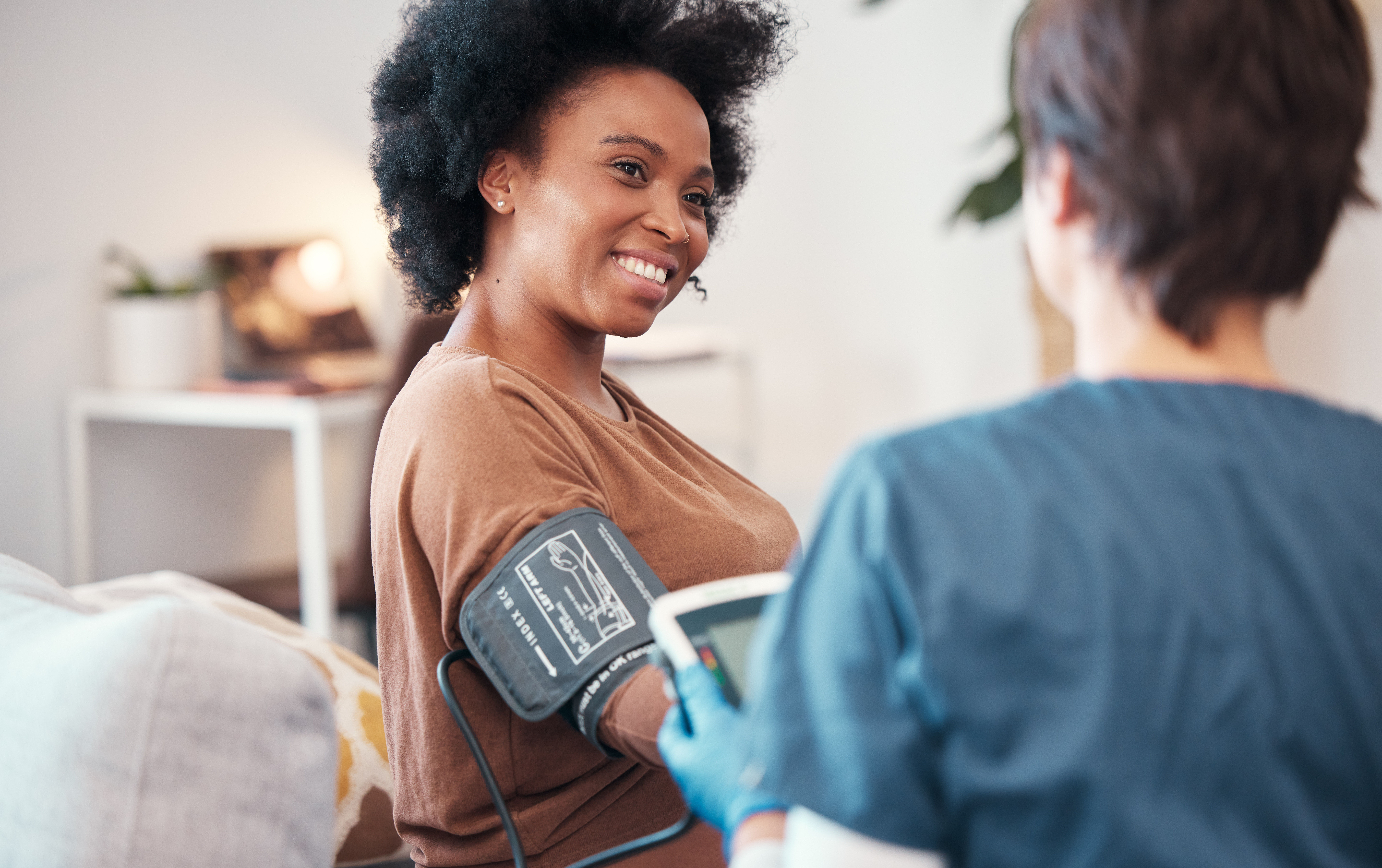 Woman Blood Pressure Cuff T Mdlungu Peopleimagescom