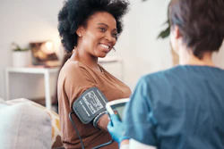 Woman Blood Pressure Cuff T Mdlungu Peopleimagescom