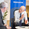 DrBicuspid.com Editor-in-Chief Kevin Henry (left) listens to Dr. Jan Derks (right) in Gothenburg, Sweden, following the Dentsply Sirona Implant Solutions World Summit in Gothenburg, Sweden.