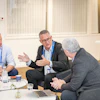 Dan Scavilla (left) and Aldo Denti (center) answer questions from DrBicuspid.com Editor-in-Chief Kevin Henry (right).