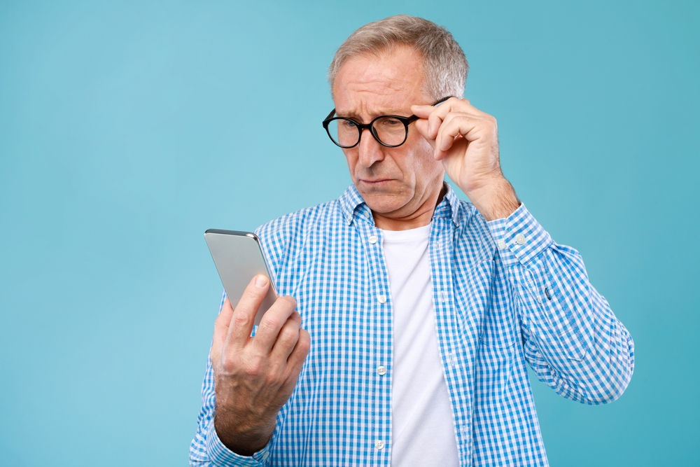 Man Smartphone Surprised Shutterstock Prostock Studio