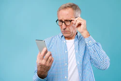 Man Smartphone Surprised Shutterstock Prostock Studio