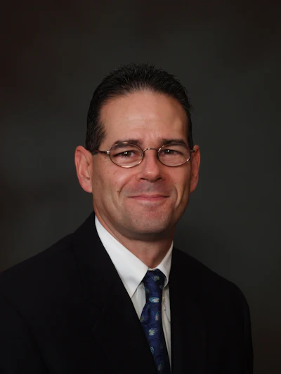 Headshot of Dr. Richard Nagelberg, the director of medical affairs at OraPharma, a division of Bausch Health.