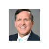 Headshot of Dr. Roger P. Levin, founder and CEO of Levin Group.