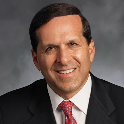 Headshot of Dr. Roger P. Levin, founder and CEO of Levin Group.