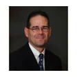 Headshot of Dr. Richard Nagelberg, the director of medical affairs at OraPharma, a division of Bausch Health.