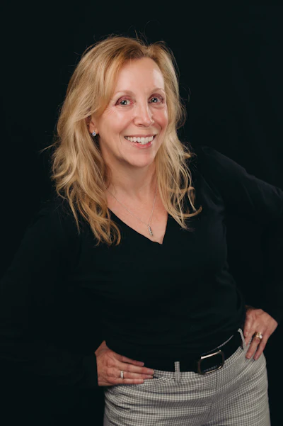 Headshot of Dr. Monique M. Nadeau, founder and CEO of Farmington Village Dental.