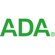 Green and white logo of the American Dental Association.