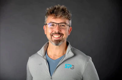 Headshot of Dr. Alex Sharp, co-founder and CEO of SPG Dental Implant Centers.