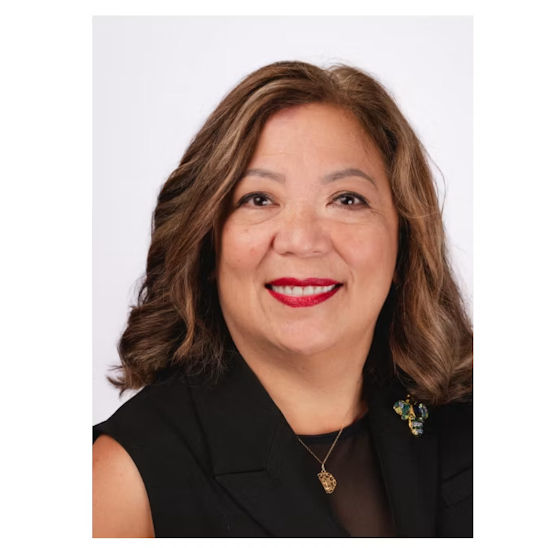 Headshot of Dr. Marie ECS Alejandrino-Buell, founder and CEO of Dental Designs.