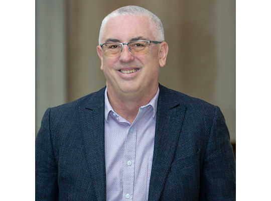 Headshot of Kevin Henry, editor in chief of DrBicupsid.com.