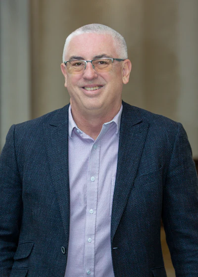 Headshot of Kevin Henry, editor in chief of DrBicupsid.com.