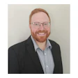 Headshot of Chris Mizenko, co-founder of Zen Dental Support.
