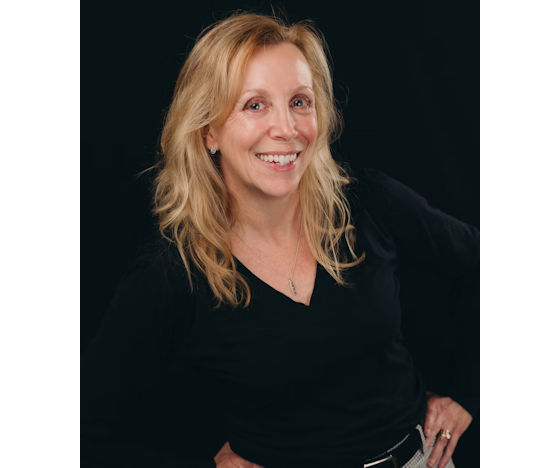 Headshot of Dr. Monique M. Nadeau, founder and CEO of Farmington Village Dental.
