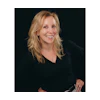 Headshot of Dr. Monique M. Nadeau, founder and CEO of Farmington Village Dental.
