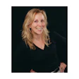 Headshot of Dr. Monique M. Nadeau, founder and CEO of Farmington Village Dental.