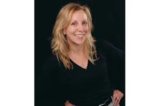 Headshot of Dr. Monique M. Nadeau, founder and CEO of Farmington Village Dental.