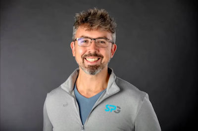 Headshot of Dr. Alex Sharp, co-founder and CEO of SPG Dental Implant Centers.